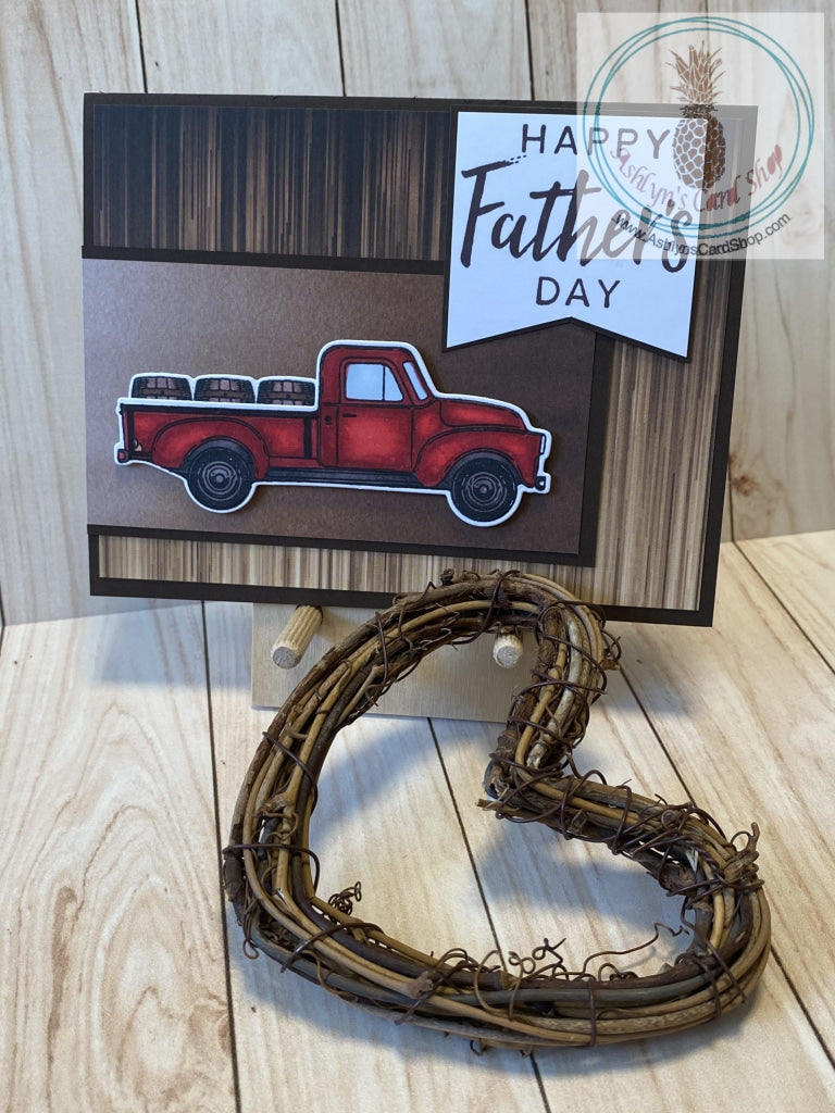 Hand coloured vintage truck with barrel cargo is popped up on a patterned paper banner with cardstock frame. The card base is also patterned paper on a cardstock frame, mounted on a white card base. The external sentiment reads "Happy Father's Day"; internal sentiment reads "Your love has helped me become who I am today. (And let's fact it . . . I'm awesome)". Add a little humour to your Dad's day card. A2 card size: 4.25 x 5.5". Coordinating envelope included. Stripes version shown.
