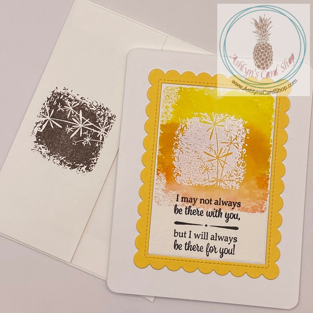 Encouragement card in yellow. Front of the card has a watercolour wash with an embossed floral image and the sentiment reads: I may not always be there with you, but I will always be there for you! Blank inside for your personal message. A2 sized card: 4.25 x 5.5”. Comes with coordinating envelope (shown).