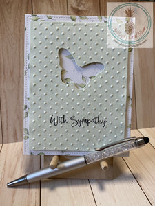 Butterfly Sympathy Card - A butterfly shape die cut out of a green patterned paper cardstock panel that has an embossed textured background and faux stitching detail.  The green panel is popped up on a patterned paper background that also has faux stitching detail.  External sentiment reads "with sympathy" and the internal sentiment reads "I am here for you always." Card size is 4.25 x 5.5" (A2). Coordinating envelope included (A2). Green leaf option.