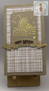 A happy birthday card with a sunflower scene embossed in gold. Linen pattern shown. Slimline card: 3.5 x 6.5". Coordinating envelope included.