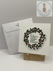 Magic Of The Season Wreath Greeting Card shown with coordinating envelope.