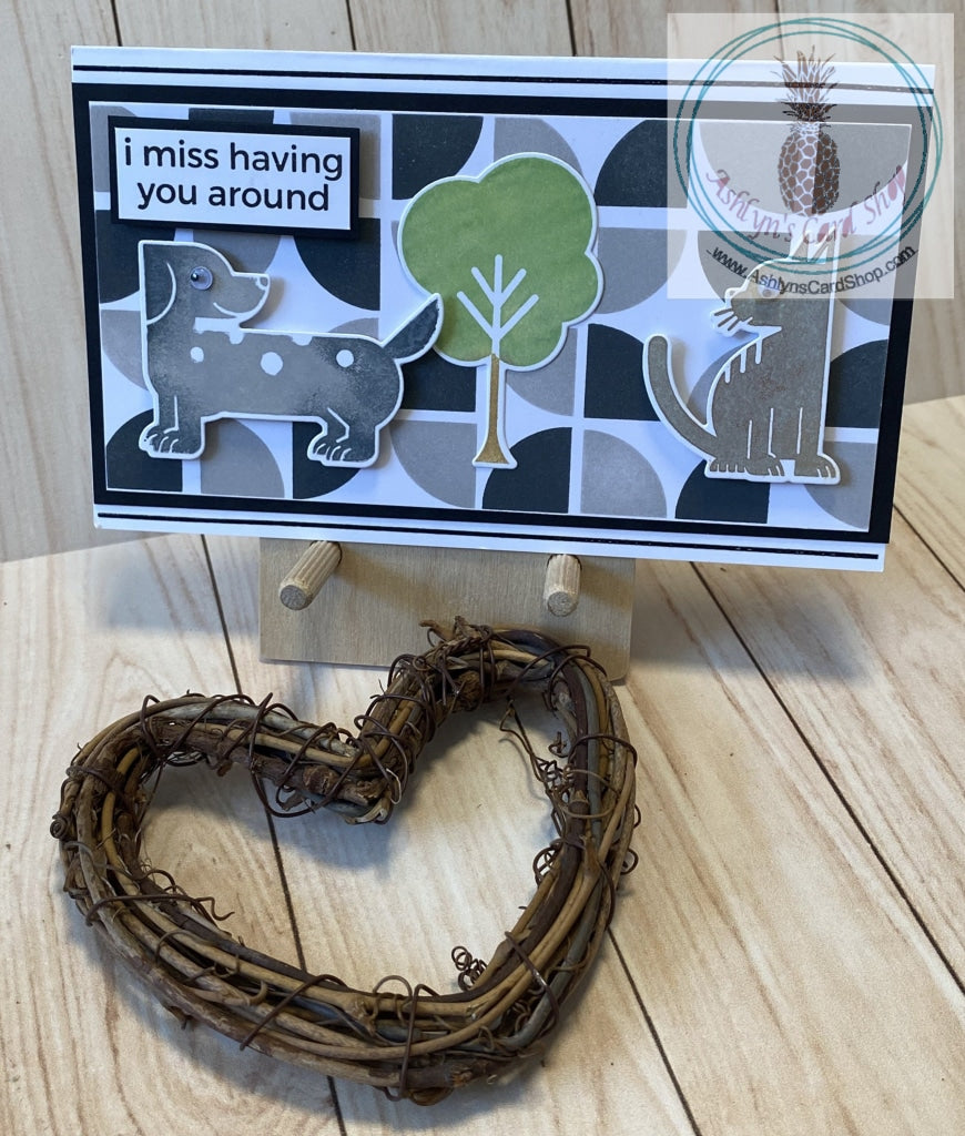 Graphic stenciled backgrounds with a variety of stylized animal shapes and sentiments to choose from. Mini slim card size (3.5 x 6").  Coordinating envelope included. Dog & Cat I Miss Having You Around card.