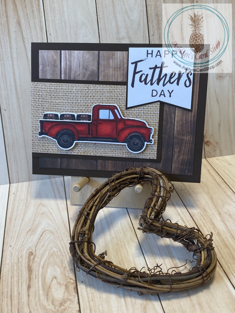 Hand coloured vintage truck with barrel cargo is popped up on a patterned paper banner with cardstock frame. The card base is also patterned paper on a cardstock frame, mounted on a white card base. The external sentiment reads "Happy Father's Day"; internal sentiment reads "Your love has helped me become who I am today. (And let's fact it . . . I'm awesome)". Add a little humour to your Dad's day card. A2 card size: 4.25 x 5.5". Coordinating envelope included. Boards version shown.
