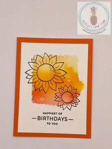 Watercolour wash background stamped with either sunflowers or a ship. The sunflower card reads: happiest of birthdays to you (external) and with age comes wisdom. Happy birthday, genius (internal). A2 size card: 4.25" x 5.5". Comes with coordinating envelope.