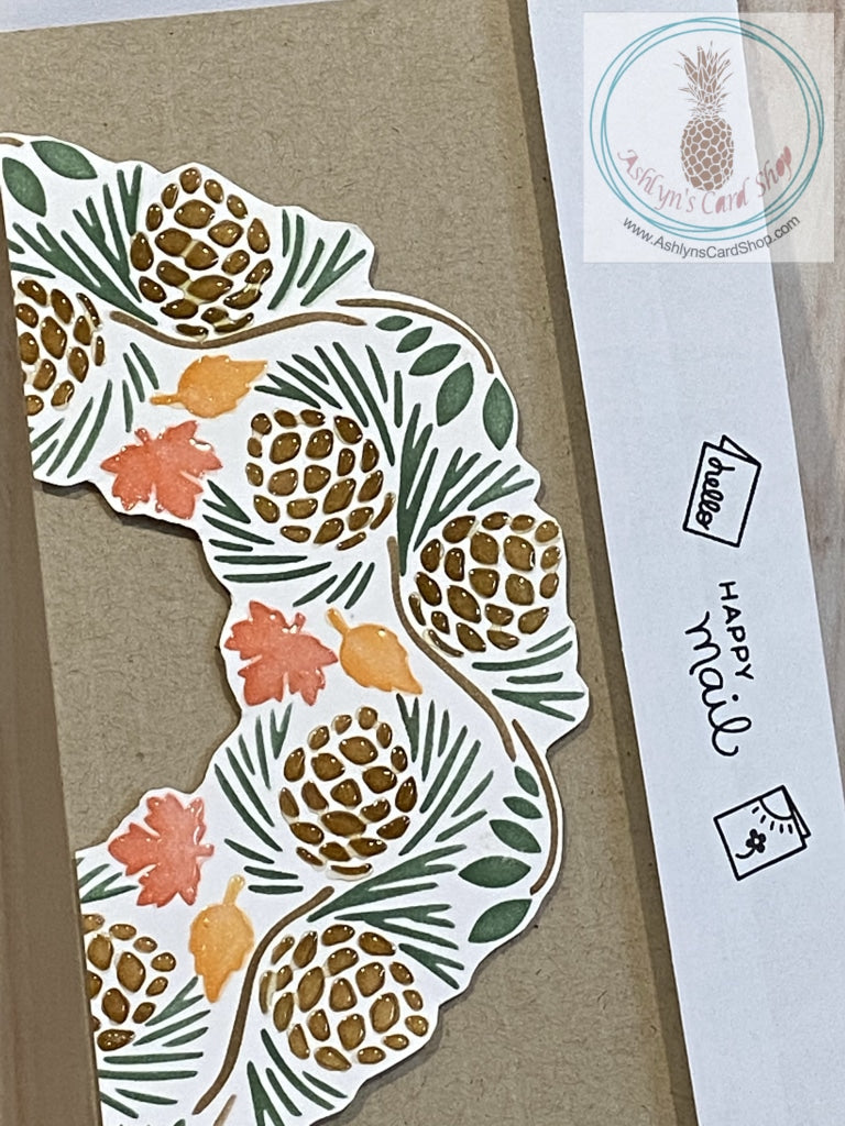 Close up of wreath detail and stamped images on coordinating envelope